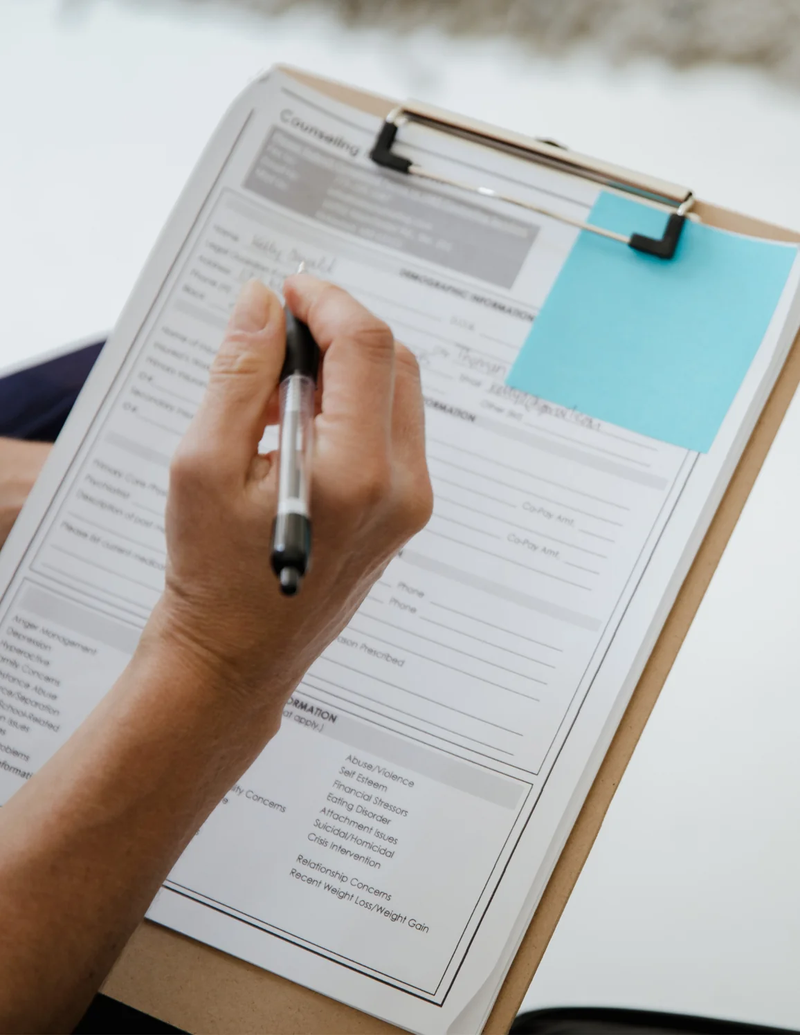 Patient completing forms